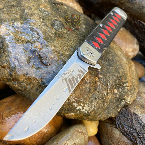 FRAMELOCK WITH BLACK AND RED FINISH STAINLESS HANDLE COOL KNIFE MTECH